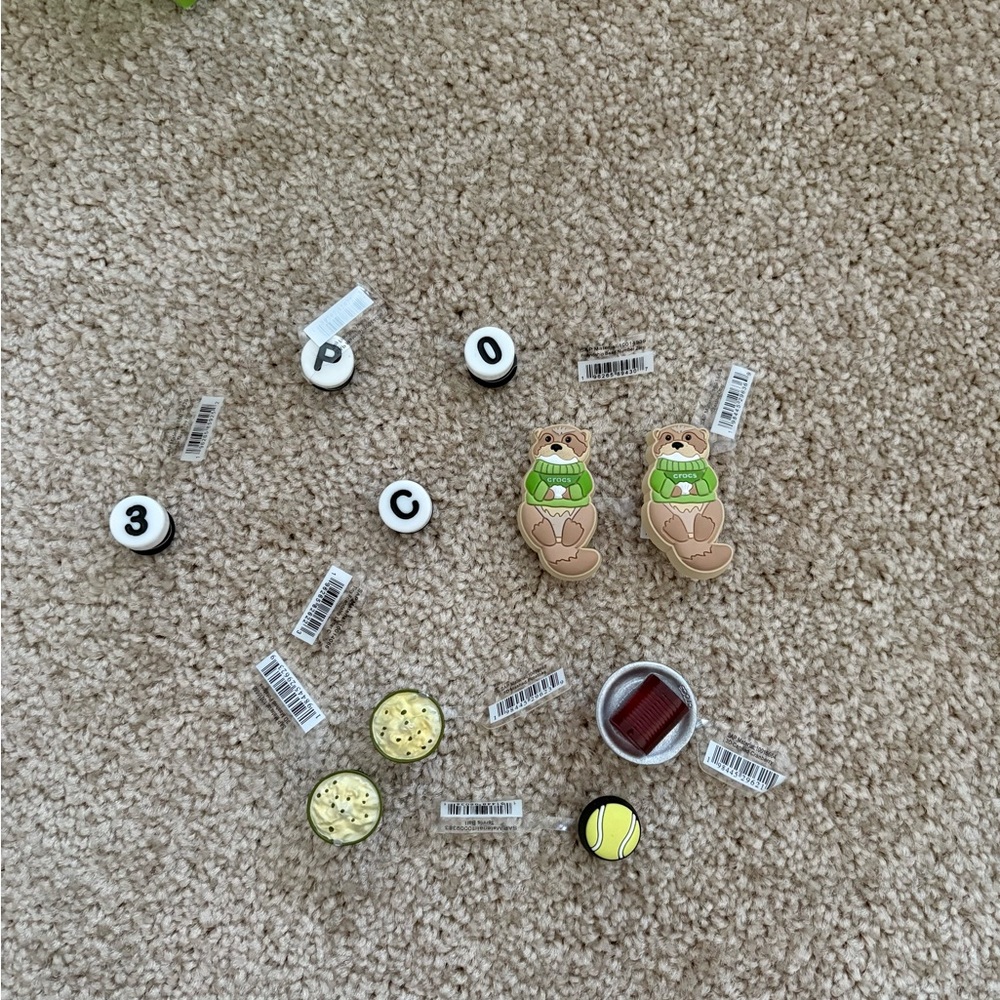 Lots of brand new Crocs Charm